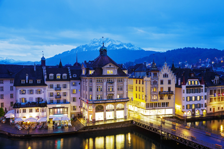 LUCERNE, SWITZERLAND - MAY 03, 2016: Night view towards buildings along the river Reuss shows unique character of Old Town and it looks to be very attractive for tourists visiting the cityのeditorial素材