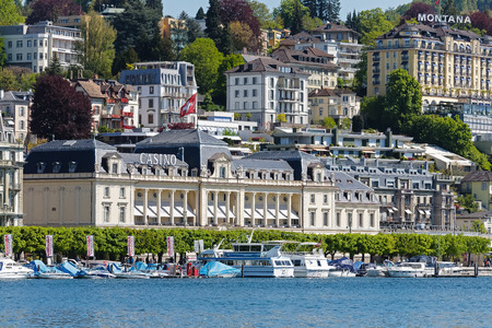 LUCERNE, SWITZERLAND - MAY 05, 2016: The classical building of The Grand Casino Luzern formerly Kursaal is located on famous lakeside promenade and is facing to lake Lucerne and was built in 1882のeditorial素材