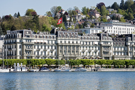 LUCERNE, SWITZERLAND - MAY 05, 2016: The Grand Hotel National front facade overlooks the lakeside promenade along Nationalquai, the hotel was opened in 1870のeditorial素材