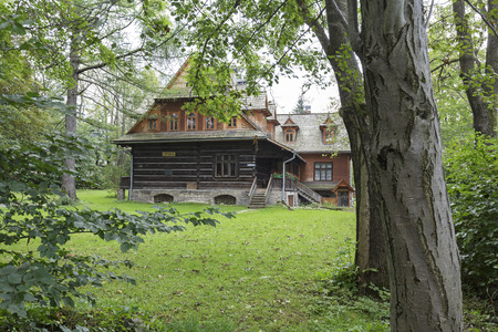 ZAKOPANE, POLAND - SEPTEMBER 20, 2016: Wooden villa named Ornak in Zakopane can be seen from front side. This villa was built in the early twentieth century and is a monument of wooden architectureのeditorial素材