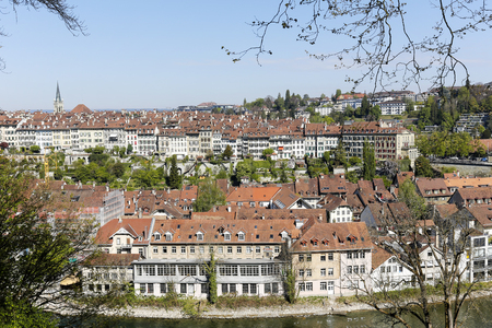 Bern, Switzerland - April 21, 2017:General view towards the old town. Old townhouses of the...