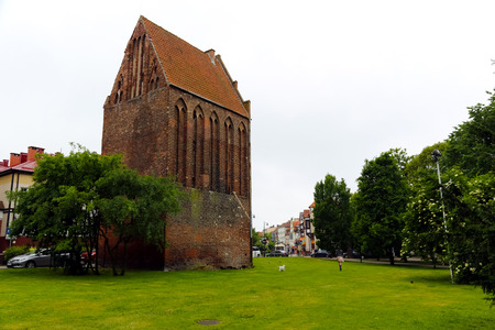 Kolobrzeg, Poland - June 17, 2017: The brick tower is a part of the medieval defense system and was built on a rectangular plan is high of four floors and is covered with the sloping roof.のeditorial素材
