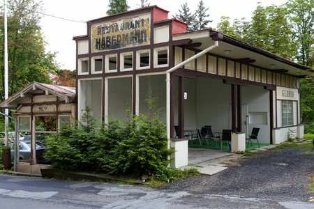 Marianske Lazne, Czechia - September 10, 2017: Pavilion where there are several tables and chairs under the roof. On the front facade there is an inscription indicating the restaurant in here.のeditorial素材
