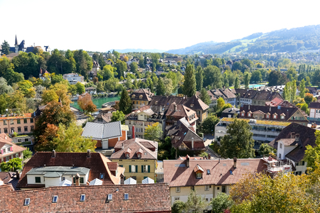 Bern, Switzerland - September 24, 2017: The landscape of this capital city it is beautiful architecture, many trees, the flowing river Aare and the surrounding nature of the Alpine country.のeditorial素材