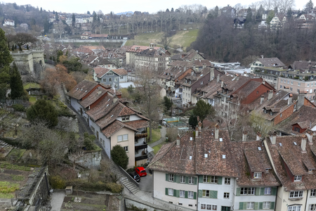 Bern Switzerland - February 19, 2018: Aerial view towards tenement houses and their roofs. It is a...