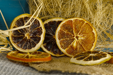 Lemon and orange slices seen with additional decorative elementsの写真素材