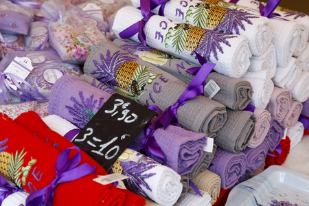 Nice, France - September 23, 2018: Small towels rolled up in small rolls and decorated with a ribbon have been put up for sale in a shop in town, this is a popular gift from Nice.のeditorial素材