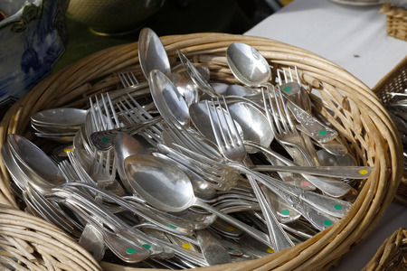 Nice, France - September 17, 2018: The cutlery was placed in a round wicker basket and was observed...