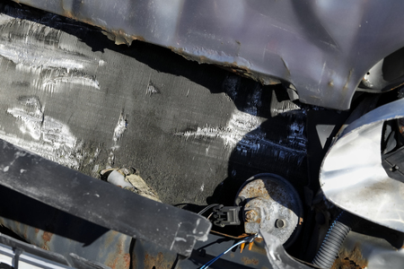 The radiator is damaged and other parts of the vehicle have also been destroyed as a result of a road crash in which the vehicle was involved.の写真素材