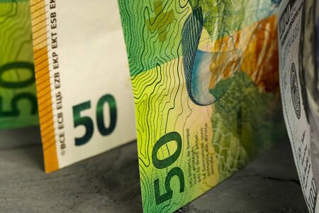 There are several various banknotes which form the financial backdrop