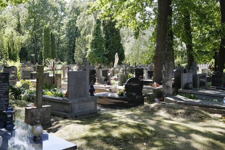 Warsaw, Poland - June 29, 2019: Graves in the municipal cemetery known as the Military Cemetery at Powazki.のeditorial素材
