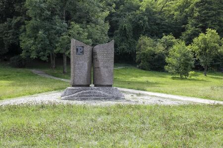 Warsaw, Poland - July 22, 2019: Monument commemorating teachers from the Secret Teachers' Organisation who taught the young generation of Poles during the German occupation 1939-1945のeditorial素材