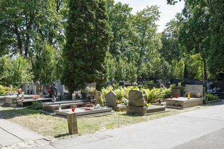 Warsaw, Poland - June 29, 2019: A general view of the graves that are at the municipal cemetery...