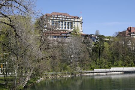 Bern, Switzerland - April 18, 2019: There's a magnificent building of a luxury hotel that seems to...