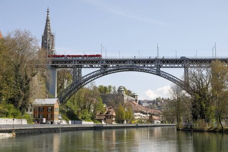Bern, Switzerland - April 18, 2019: There's a bridge over the Aare River. In the area there are...