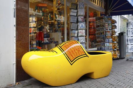 The Hague, The Netherlands - October 07, 2019: In front of the souvenir shop there is a large wooden...