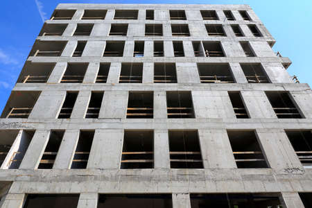 Warsaw, Poland - May 10, 2020: A large building has already been built but there is still a lot of...