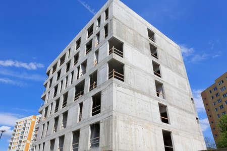 Warsaw, Poland - May 10, 2020: New large building has already been built but there is still a lot of work to be done to complete it. This buildings is in housing estate locally called Goclaw.のeditorial素材