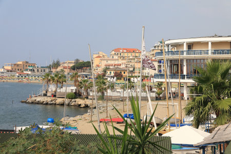 Sanremo, Italy - July 04, 2009: A scenic view of the seaside town with beach areas and city buildings.のeditorial素材