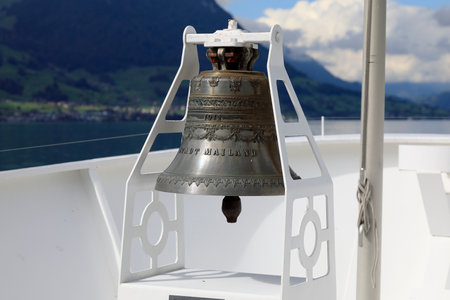 Weggis motor vessel, Switzerland - September 01, 2020: The ship's bell is a sound signaling device. This bell is installed on a ship named Weggis that sails the waters of Lake Lucerne.のeditorial素材