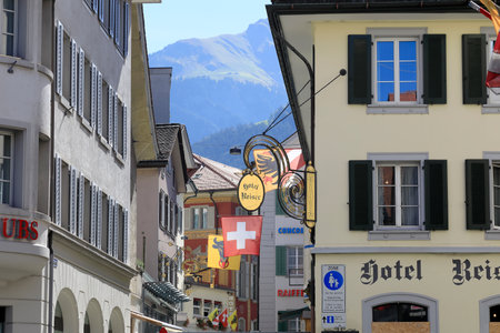 Altdorf, Switzerland - August 27, 2020: View between the houses what can be seen above the street.のeditorial素材
