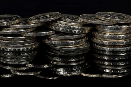 Swiss money. Swiss franc coins, a number of which have been piled up. CHF currency.の写真素材