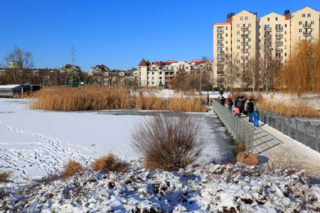 Warsaw, Poland - January 31, 2021: A winter view of the apartment building and parkland on the Goclaw housing estate.のeditorial素材