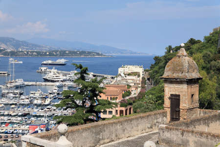 Monaco - June 06, 2009: Marina in which many yachts are moored is on Mediterranean. Slightly farther away, the hills are visible.のeditorial素材