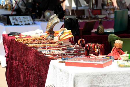 Cannes, France - July 05, 2009: Many old small items were placed for sale at one of the stalls during the famous outdoor market in the city.のeditorial素材