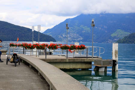 Beckenried, Switzerland - September 1, 2020: Cruise ship station on the edge of Lake Lucerne. The...