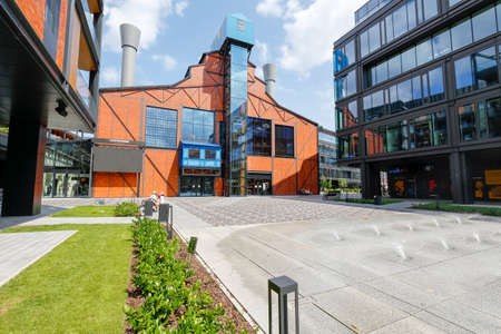 Warsaw, Poland - July 19, 2021: The old industrial building, over 100 years old, used to house a power plant. Today, after revitalization it is a modern shopping mall locally named Elektrownia Powisleのeditorial素材