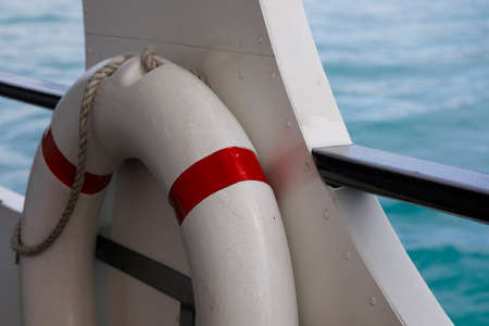 Life Buoy fixed on side of motor vessel.
