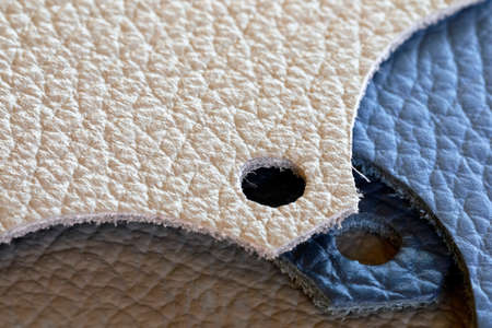 Natural leather upholstery samples are shown up close.