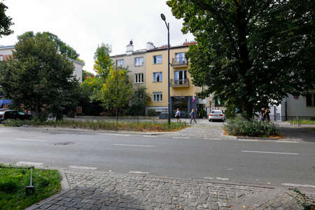 Warsaw, Poland - September 13, 2021: On the other side of the street there are residential buildings in Saska Kepa housing district. There is no traffic on the street now.のeditorial素材