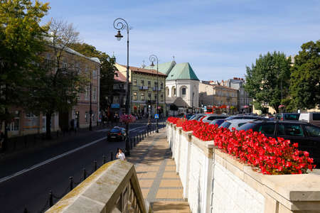 Lublin, Poland - September 11, 2021: Generic view of one of the streets in the city. There is a parking lot nearby the street.のeditorial素材
