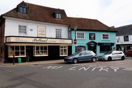 Arundel, England, UK - June 06, 2010: Traditional buildings with stores offering a variety of food...