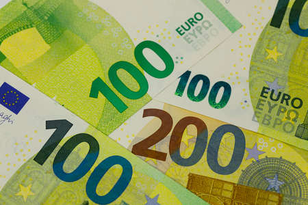 There are European Union banknotes placed next to each other. Euro banknotes are not made of paper, but of pure cotton fiber to improve their durability. EUR currency.の写真素材