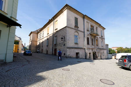 Lublin, Poland - September 11, 2021: An old tenement house on a paved street is part of the Old Town...