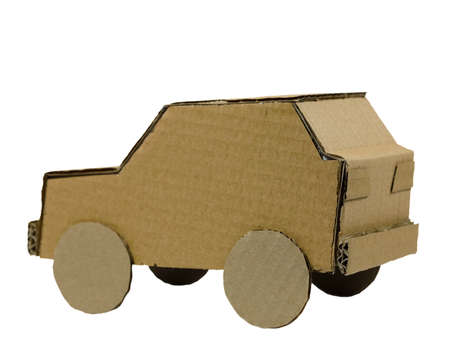 Car model made of cardboard. Recycled packaging material has been used to handcraft this car model.の写真素材