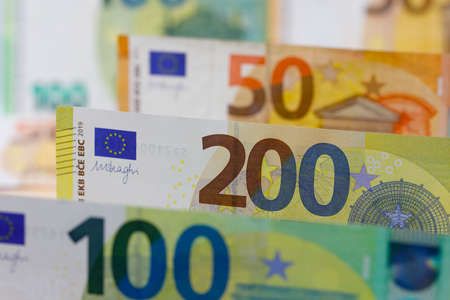 European Union banknotes placed next to each other. Euro banknotes are not made of paper, but of pure cotton fiber to improve their durability. EUR currency.の写真素材