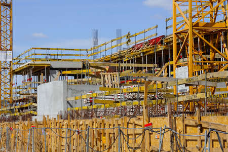 Warsaw, Poland - April 18, 2022: Place of construction of a new apartment block located in the...