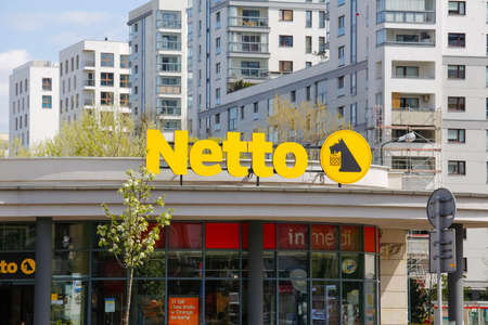 Warsaw, Poland - April 30, 2022: The sign and name of the Netto chain of stores. It is one of the...