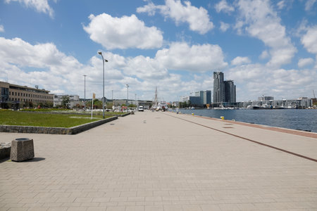 Gdynia, Poland - June 3, 2022: View along the southern pier of the port towards Kosciuszko Square, In the distance there are modern residential buildings and a hotel of a well-known brandのeditorial素材
