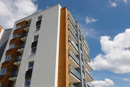 Warsaw, Poland - July 3, 2022: Modern multi-storey residential building in the Goclaw housing estate, in the Praga Poludnie district of the city of Warsaw.のeditorial素材