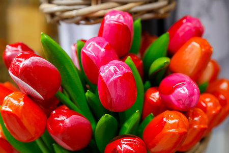 Bunch of multicolored artificial tulips made of woodの写真素材