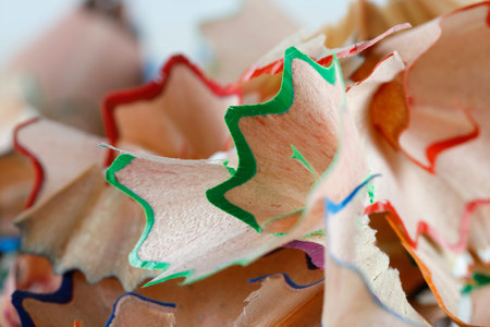 A pile of wooden shavings from sharpening colored pencils can now simply be used as a creative background.の写真素材