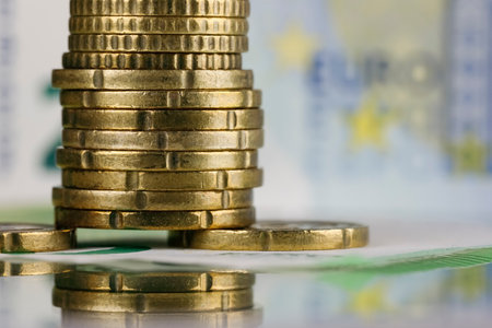 The currency of the European Union is visible here, there are coins and there is paper money in the background. Coins and banknotes can be used as illustrations for many various financial issues.の写真素材