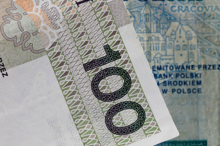 Polish money. Polish zloty banknotes placed next to each other can be used as illustrations for many various financial issues. PLN currency.の写真素材