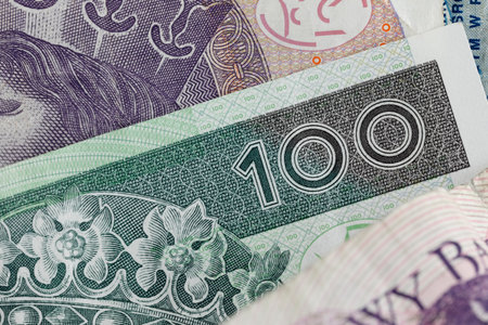 Polish money. Polish zloty banknotes placed next to each other can be used as illustrations for many various financial issues. PLN currency.の写真素材