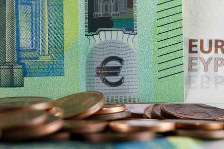 The currency of the European Union is visible here, there is paper money and there are small coins. Banknotes and coins can be used as illustrations for many various financial topics.の写真素材